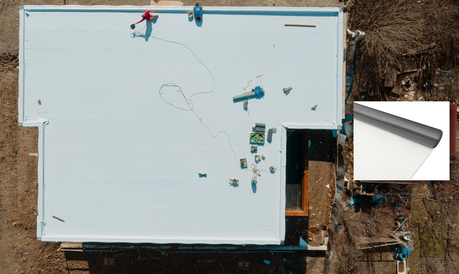 Aerial view of a clean white membrane roof